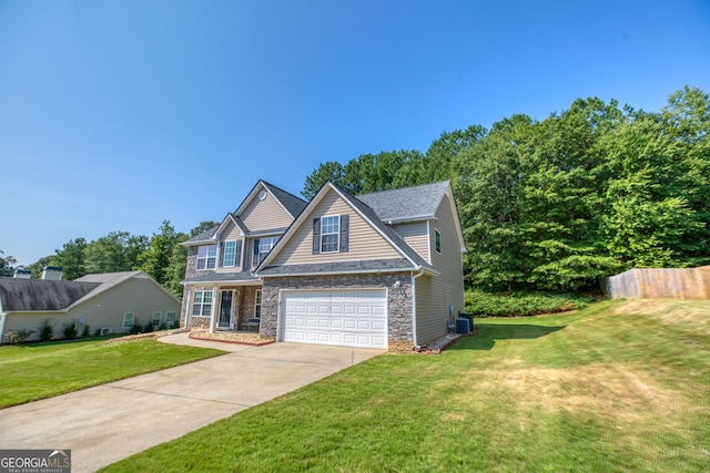 view of front of home featuring driveway, stone siding, fence, central air condition unit, and a front lawn