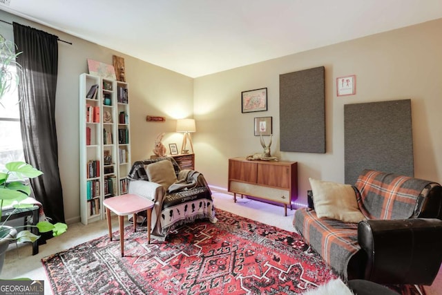 sitting room with light carpet