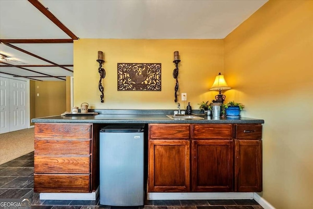 bar featuring a sink