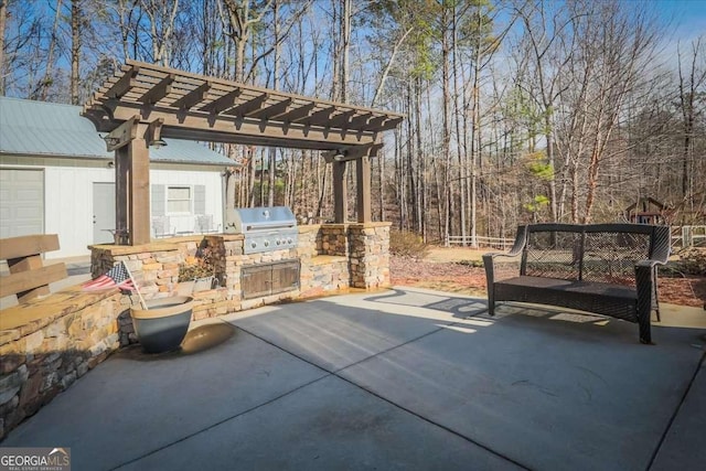 view of patio with grilling area, area for grilling, and a pergola