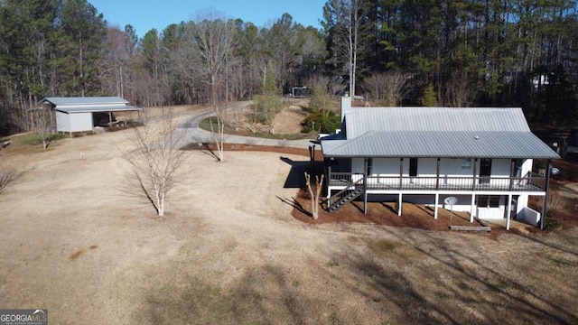 exterior space with a forest view