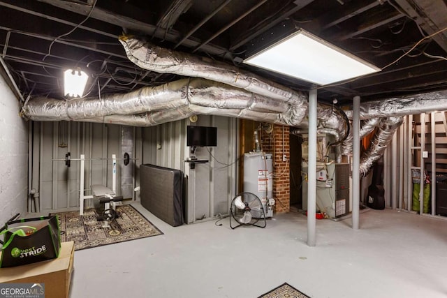 unfinished basement featuring water heater