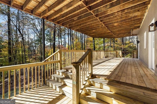 wooden deck featuring stairway