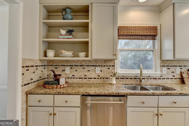 kitchen with light stone counters, open shelves, backsplash, a sink, and dishwasher