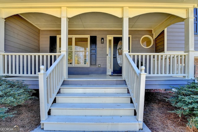 entrance to property with covered porch