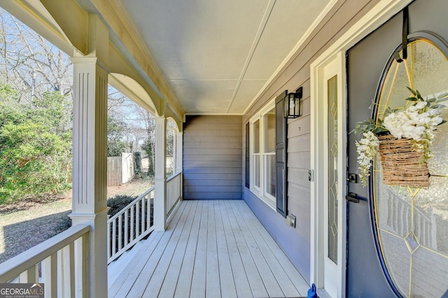 wooden terrace with covered porch