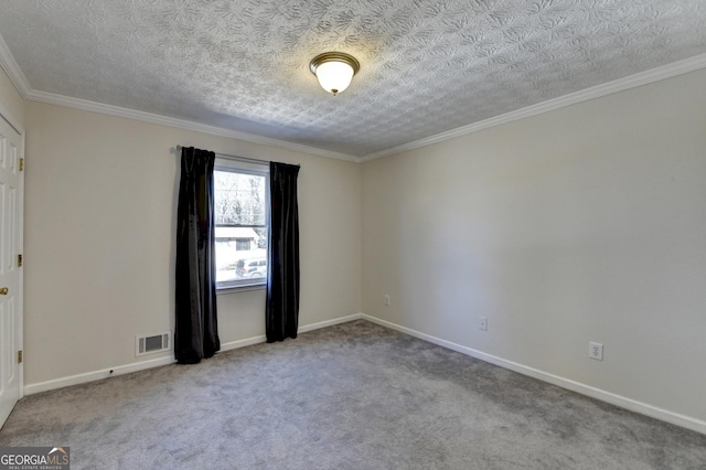 unfurnished room with baseboards, a textured ceiling, visible vents, and carpet flooring