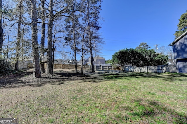 view of yard featuring fence