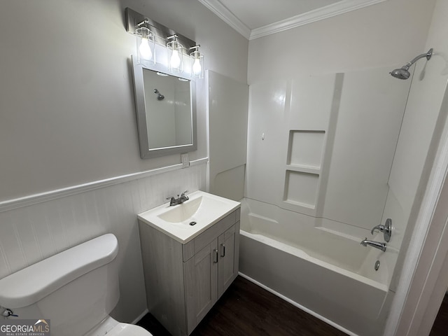 full bath with toilet, a wainscoted wall, vanity,  shower combination, and crown molding