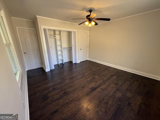 unfurnished bedroom featuring a ceiling fan, baseboards, ornamental molding, a closet, and dark wood-style floors