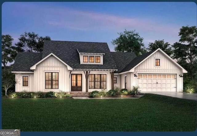 modern farmhouse style home featuring driveway, a garage, roof with shingles, board and batten siding, and a front yard