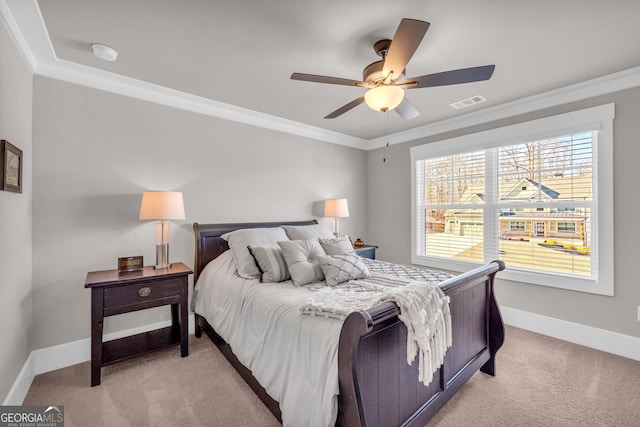 bedroom with light carpet, visible vents, baseboards, a ceiling fan, and ornamental molding