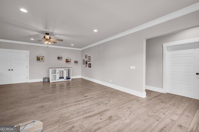 unfurnished living room with light wood finished floors, baseboards, a ceiling fan, ornamental molding, and recessed lighting