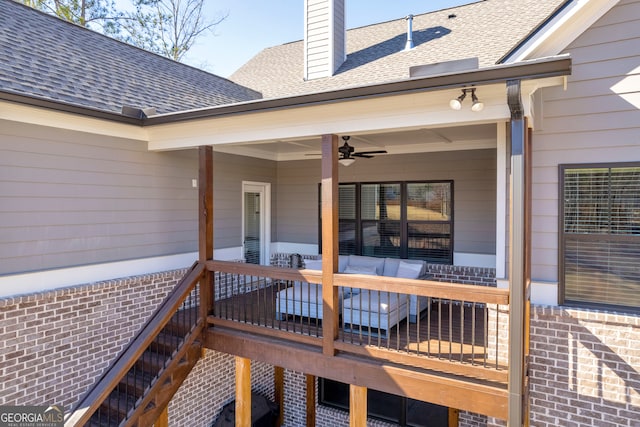 wooden deck with ceiling fan