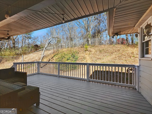 wooden deck featuring fence