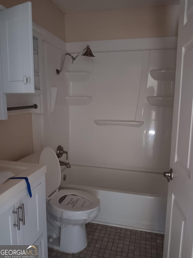 full bath featuring  shower combination, vanity, and toilet