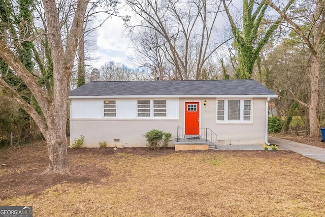 single story home with crawl space and brick siding