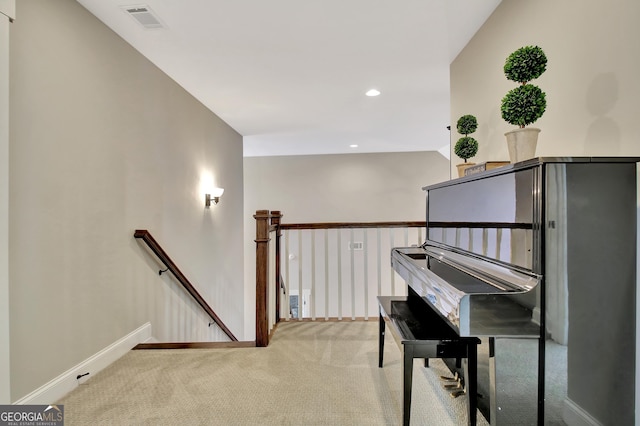 sitting room featuring recessed lighting, carpet flooring, visible vents, an upstairs landing, and baseboards