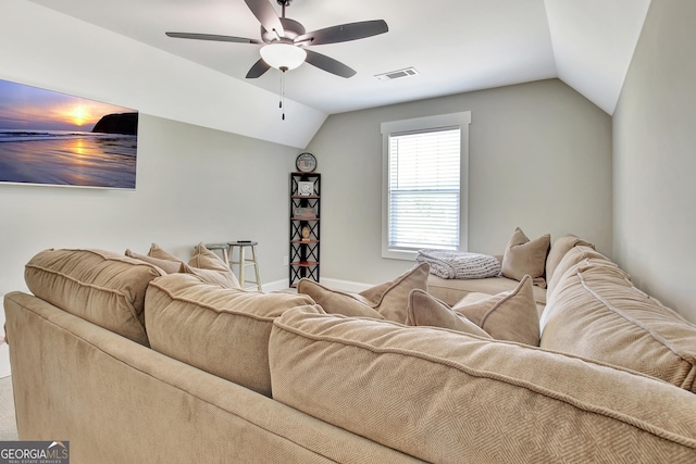 living room with lofted ceiling, visible vents, ceiling fan, and baseboards