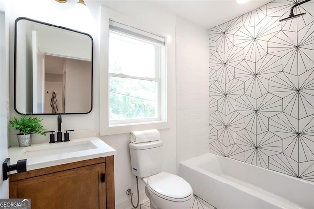 full bathroom featuring toilet, bathtub / shower combination, and vanity