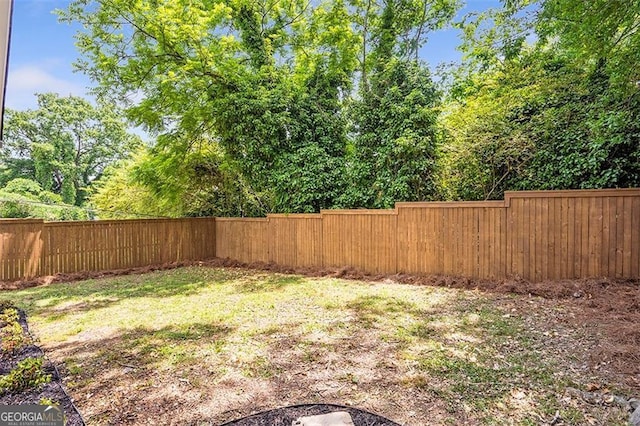 view of yard featuring a fenced backyard