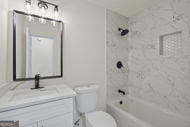 bathroom with washtub / shower combination, vanity, toilet, and a textured ceiling