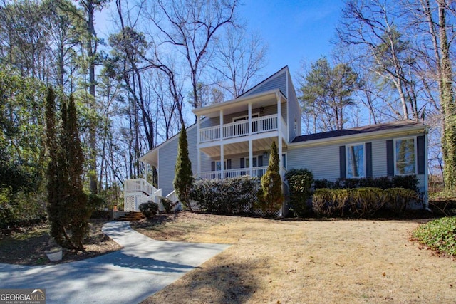 view of front of property with a balcony