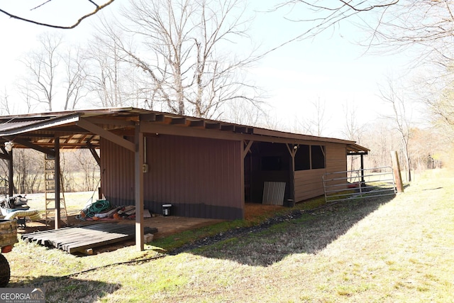 exterior space featuring an outbuilding and an exterior structure