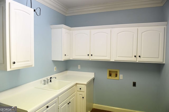 laundry area featuring hookup for a washing machine, cabinet space, a sink, electric dryer hookup, and baseboards