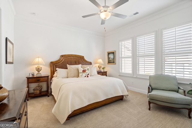 bedroom with crown molding, baseboards, visible vents, and light colored carpet