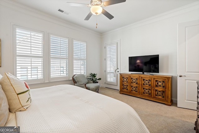 carpeted bedroom with a ceiling fan, access to outside, visible vents, and crown molding