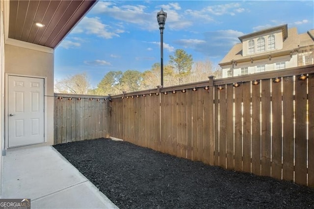 view of yard featuring a fenced backyard