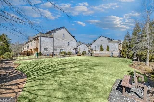 view of yard with fence