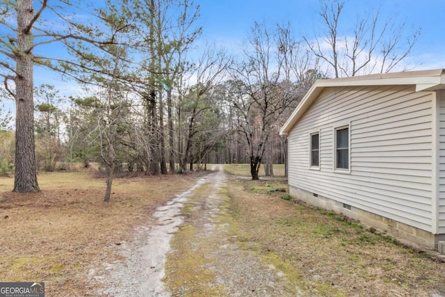 view of road with driveway