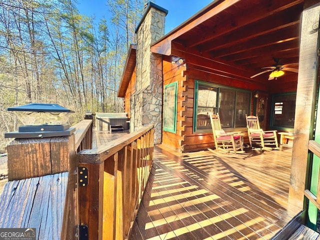 wooden terrace with ceiling fan