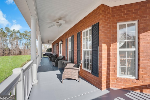 view of patio / terrace with a ceiling fan and a porch