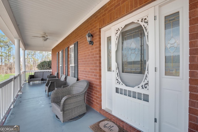 view of patio featuring a ceiling fan