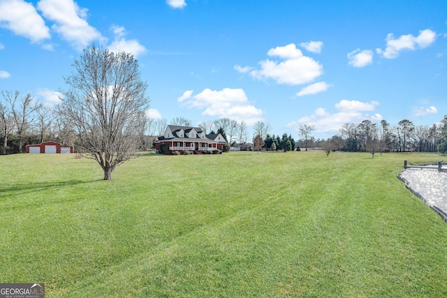 view of yard featuring a garage