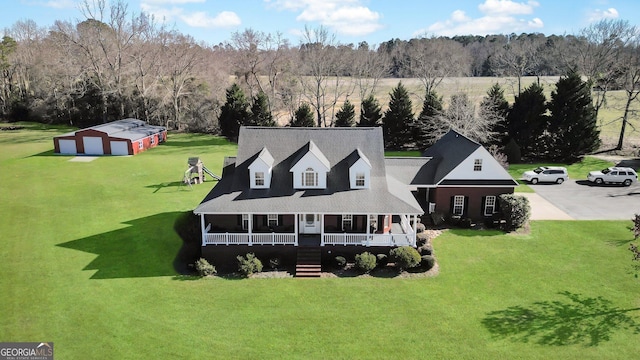 exterior space featuring a wooded view