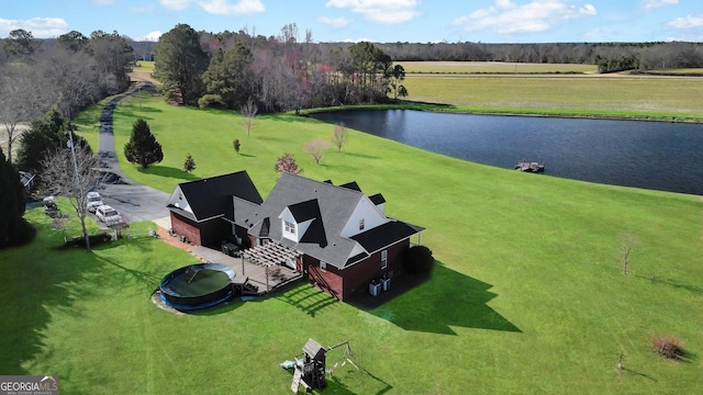 drone / aerial view featuring a water view and a rural view