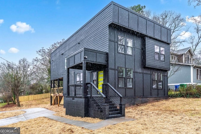 view of front of home with fence