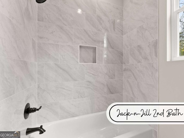 bathroom featuring shower / tub combination