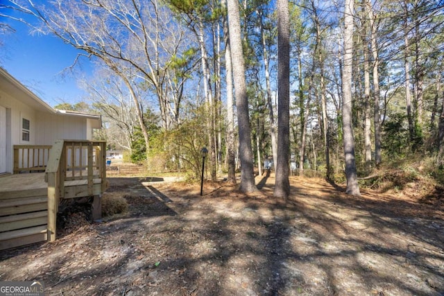 view of yard with a deck