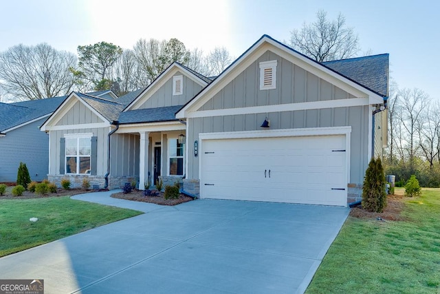 view of front of property with an attached garage, concrete driveway, board and batten siding, and roof with shingles