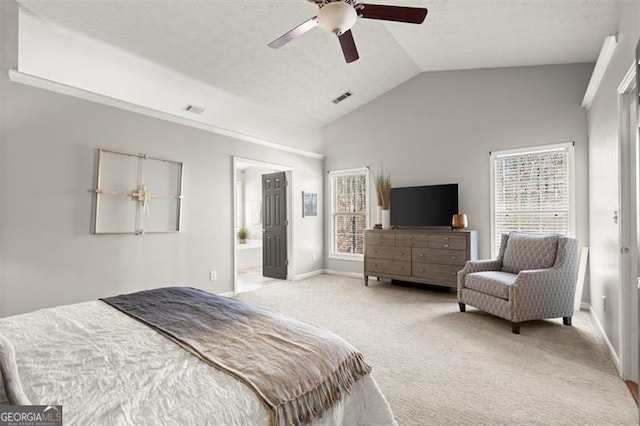 bedroom with lofted ceiling, visible vents, light carpet, and multiple windows