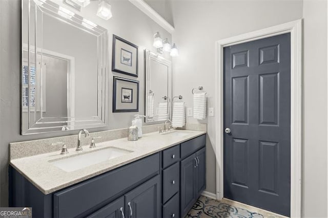 bathroom featuring double vanity and a sink