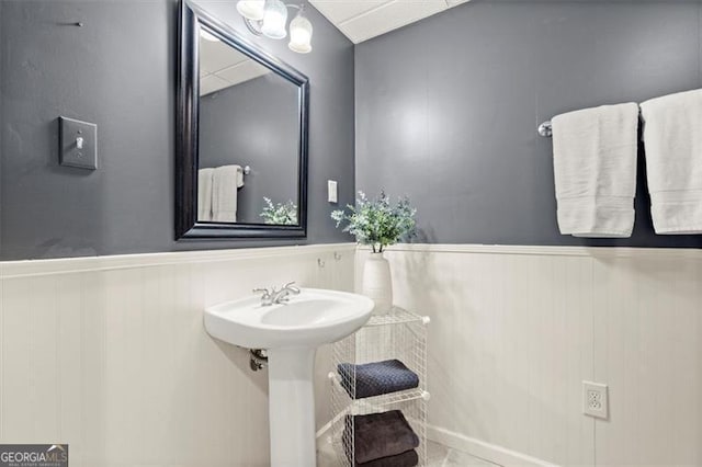 bathroom featuring wainscoting