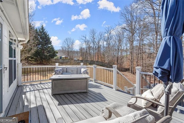 deck with outdoor lounge area