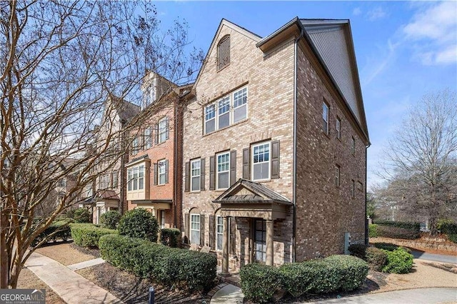 multi unit property featuring brick siding