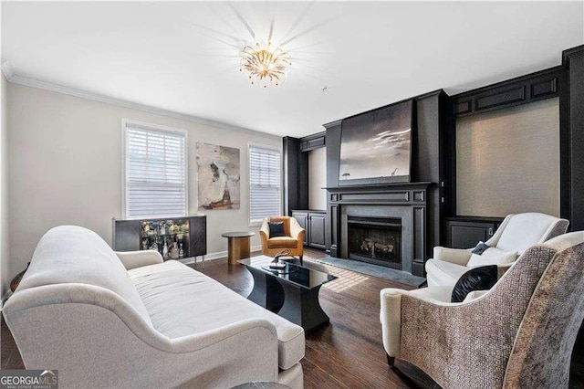 living area with dark wood-type flooring, baseboards, ornamental molding, and a fireplace with flush hearth